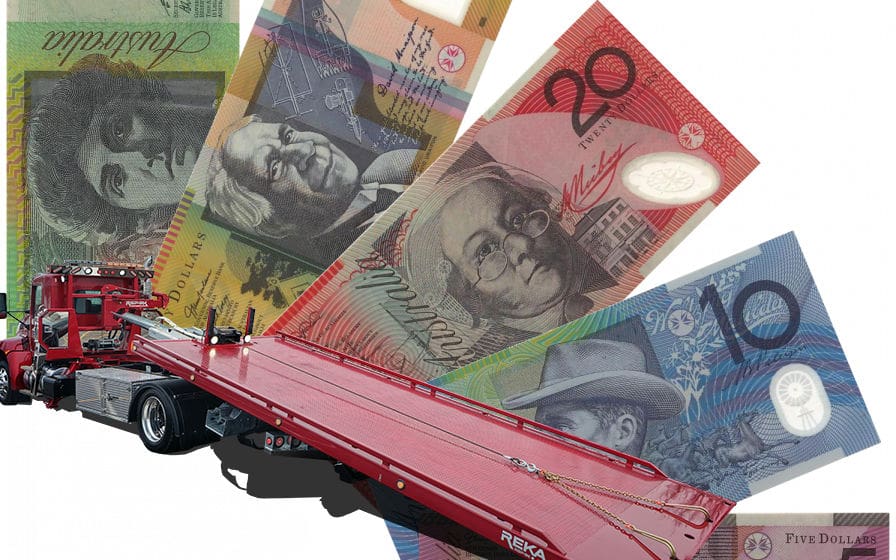 Red Truck with Aud Notes Behind It From Our FAQ